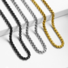 Multiple finished silver, gold, and black Venetian box chains laid flat to show matching lobster clasps and secure end connectors for B2B supplier.