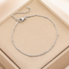 07XB~V1NQVTDA0D@HVAEOP6 A finished Silver stainless steel beaded satellite snake chain bracelet with a sturdy lobster clasp and adjustable link extension chain.