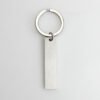 Technical dimensions of a flat rectangle metal bar keychain showing 45mm by 10mm pendant and 28mm key ring size for B2B supplier catalog.Can be used for laser engraving custom text.