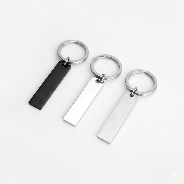 Technical dimensions of a flat rectangle metal bar keychain showing 45mm by 10mm pendant and 28mm key ring size for B2B supplier catalog.Can be used for laser engraving custom text.