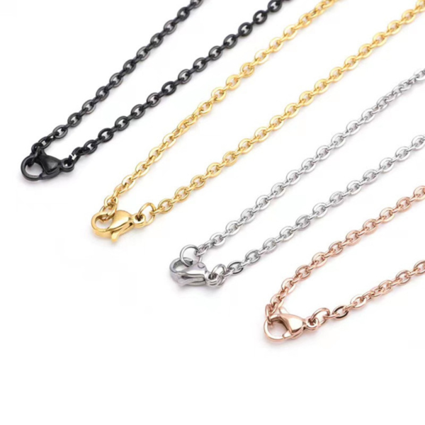 Wholesale finished stainless steel cable chain necklaces with lobster clasps in black, 18K gold, silver, and rose gold finishes for pendant bases.