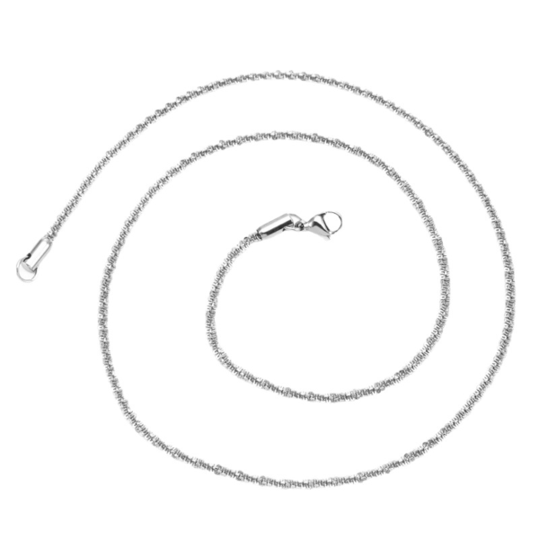 SMW{MC(M@5F8B)}[9J6TAN5 Isolated view of a single finished silver stainless steel twisted sparkle chain necklace with a lobster clasp in a circular coil layout.