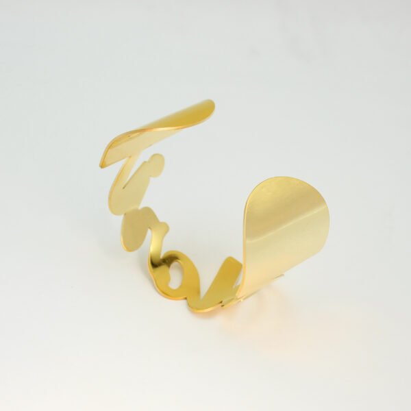 大字母手镯_0002_图层 5 Multi-angle technical layout of a custom gold stainless steel script lettering cuff bangle for international jewelry business catalog.