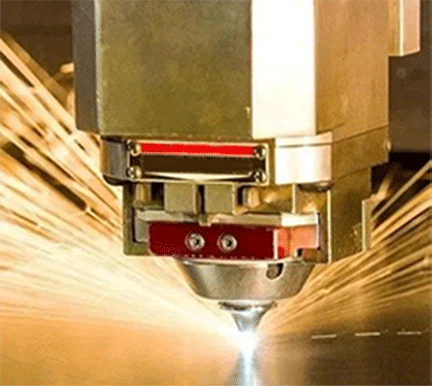 A laser cutting machine is cutting stainless steel ornaments.