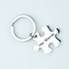 拼图钥匙扣 (2) A finished silver metal puzzle bar keychain with custom text "Her Weirdo" laid flat on a clean white backdrop for B2B catalog.
