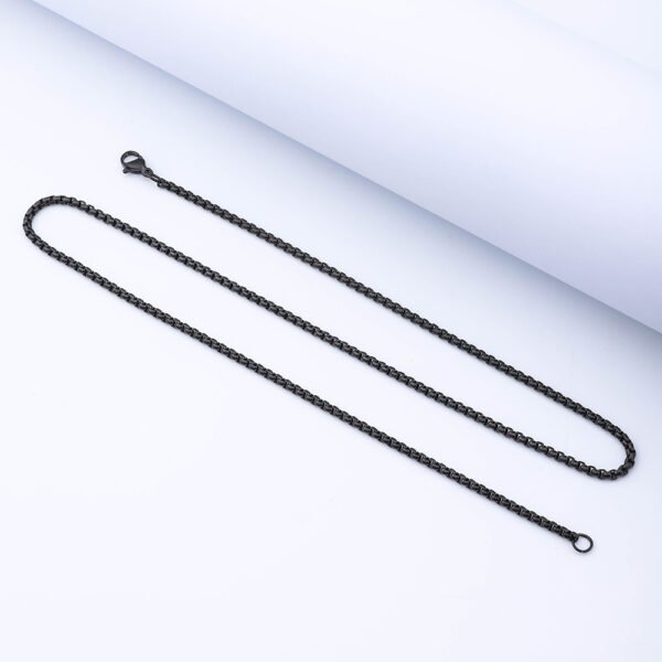 A sleek, black stainless steel box chain necklace with a lobster clasp, displayed laid flat against a clean white background.