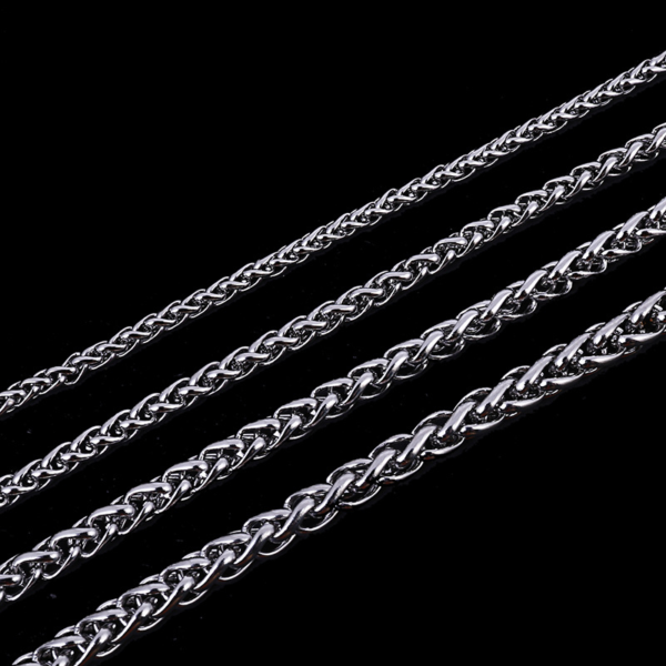 Wholesale finished silver stainless steel wheat spiga chain necklaces in multi-size widths from 2mm to 6mm arranged neatly on a black background.