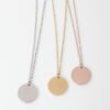 20圆牌和十字链 04 Parallel display of bulk customized stainless steel round metal tag necklaces in silver, gold, and rose gold finishes hanging against white background.