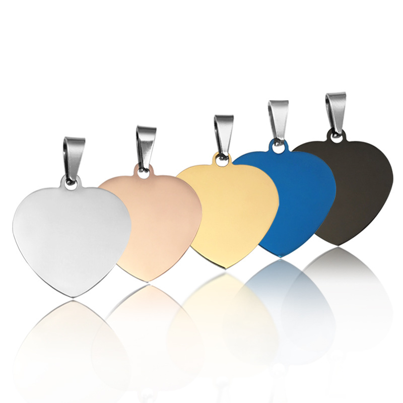 Wholesale custom stainless steel heart pendant blanks with bails in silver, rose gold, 18K gold, royal blue, and matte black for laser engraving photo jewelry.