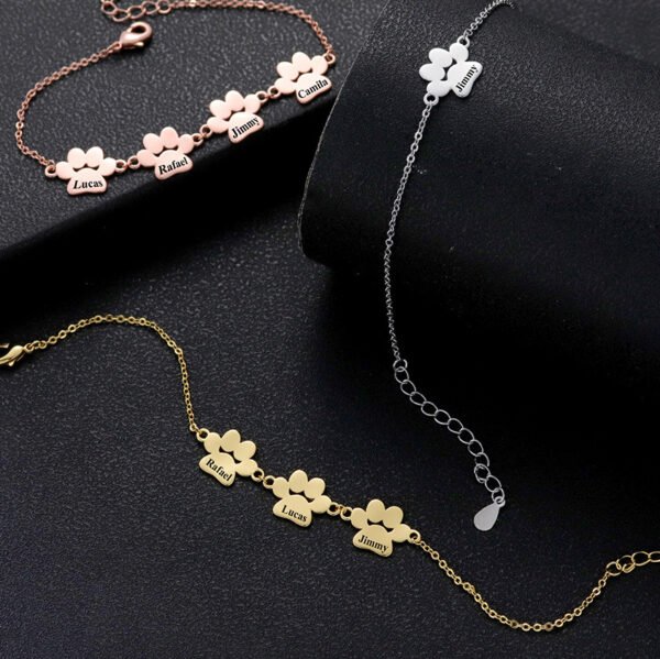 Parallel display of bulk customized stainless steel multi-paw bracelets in rose gold, silver, and gold finishes ready for laser engraving catalog.