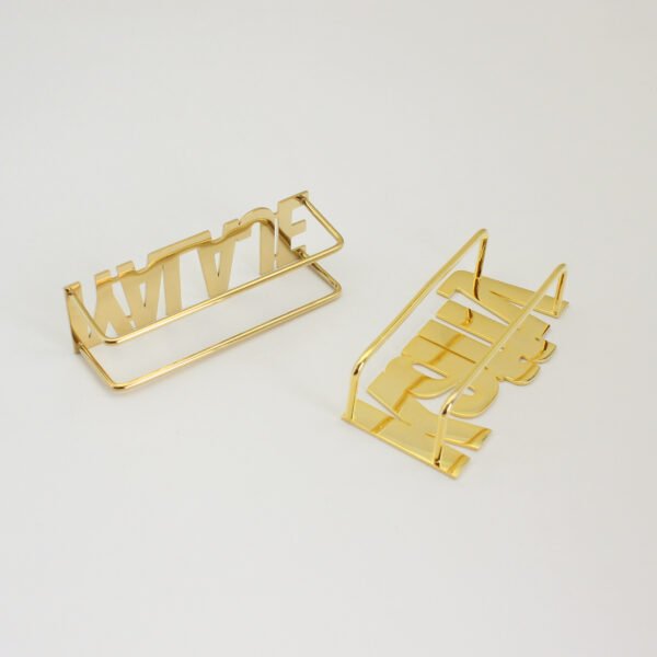 Parallel display of wholesale personalized gold stainless steel block letter rings from front and top angles highlighting the heavy-duty rail support.