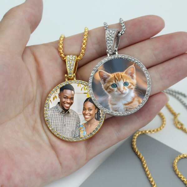 Wholesale finished silver and 18K gold plated stainless steel rhinestone photo pendant necklaces held in a hand custom printed with cat and couple pictures.