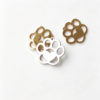 Parallel display of bulk customized stainless steel heart paw stampings in rose gold, silver, and gold finishes highlighting the high mirror polish.