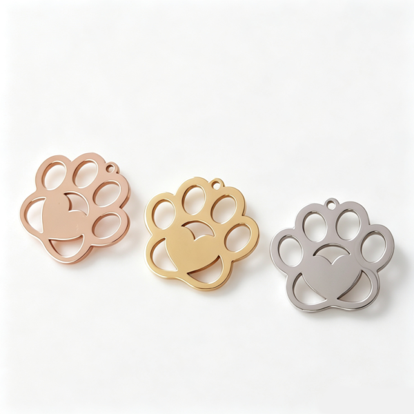 Wholesale blank hollow heart paw print stainless steel charm pendants in rose gold, gold, and silver finishes for custom pet ID tags catalog.