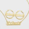 描边项链耳环套装_0000_图层 14 A blank finished 18K gold plated stainless steel personalized 2-layer cursive name necklace and hoop earrings set spelling "Anikeade" on a white background.
