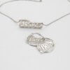描边项链耳环套装_0008_图层 8 An isolated view of a wholesale finished silver stainless steel custom name jewelry set showing a 3D 2-layer nameplate necklace and matching hoop earrings with the text "Bose".