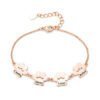 A single blank mirror polished rose gold plated stainless steel family nameplate bracelet with 4 connected paw tags and a secure lobster clasp.