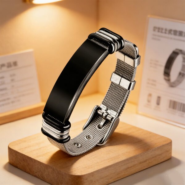 A blank finished two-tone black and silver stainless steel Milanese loop identity bracelet with a buckle clasp displayed elegantly on a wooden tray for B2B supplier shop.