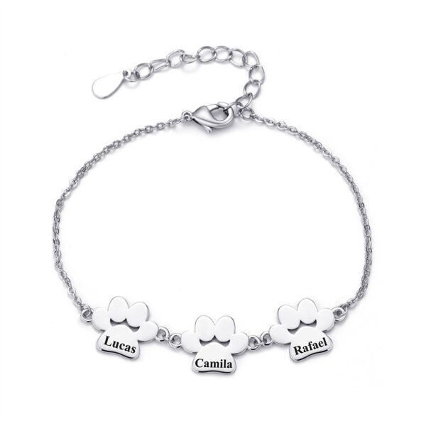 A minimalist, mirror-polished silver stainless steel bracelet featuring three interconnected paw-print charms and a secure lobster clasp.