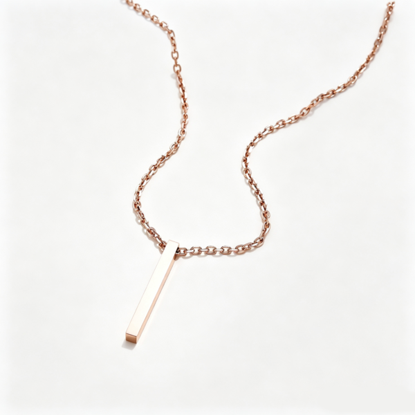 An isolated view of a single blank mirror polished rose gold plated stainless steel vertical 3D column charm necklace on a clean white background.