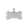 A single blank mirror polished silver stainless steel bone charm pendant with a hanging bail laid flat on a white clean backdrop.