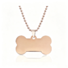 A finished rose gold plated stainless steel bone pendant necklace with a matching ball chain displayed on a clean white background for B2B supplier.