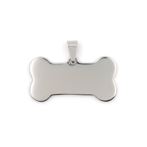 A single blank mirror polished silver stainless steel bone charm pendant with a hanging bail laid flat on a white clean backdrop.