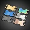 Six stainless steel slip-on bone-shaped collar tags, showcasing a brushed finish on the back. They come in gold, rainbow, blue, silver, black, and rose gold, arranged diagonally against a black background.