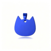 A vibrant royal blue anodized stainless steel cat head silhouette pendant, highlighted on a reflective bright white surface.