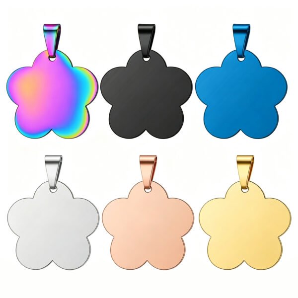 Six stainless steel flower-shaped tags with pendant bails displayed in two rows, showcasing rainbow anodized, matte black, royal blue, silver, rose gold, and gold finishes.