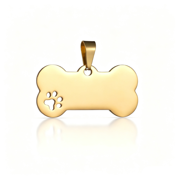 A high-shine gold-plated stainless steel bone tag with a cutout paw design and pendant bail, with a soft casting shadow.