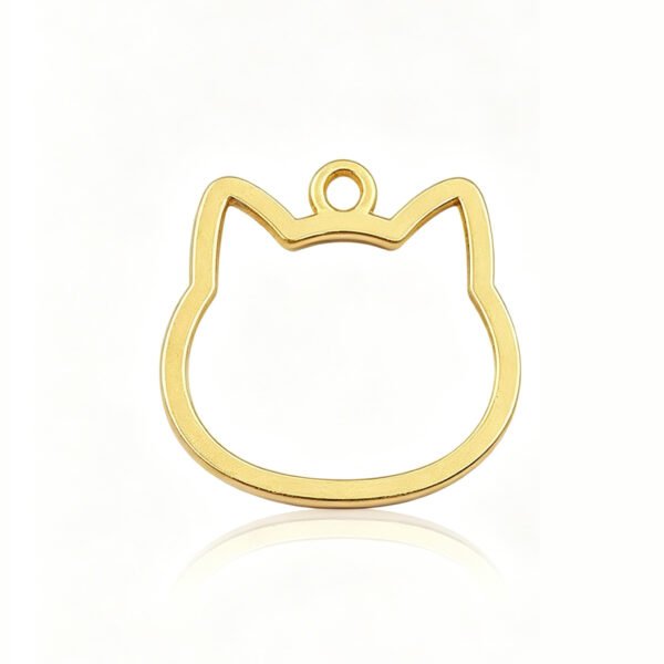 A single mirror-polished gold stainless steel cat head silhouette frame pendant with a top loop, isolated on a white background with a soft reflection.